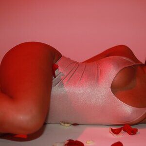 Pink metallic body suit